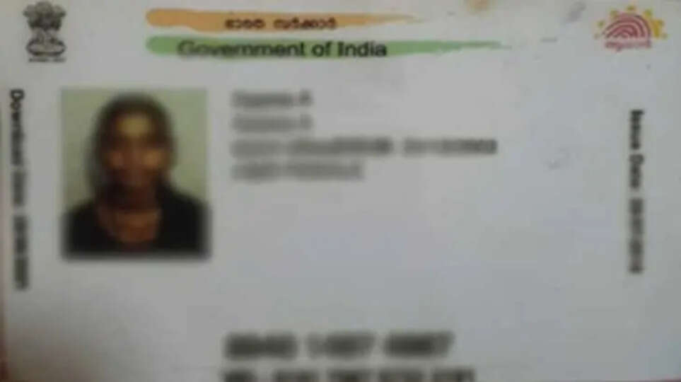 A candidate undergoing Aadhaar verification at a UPSC exam center