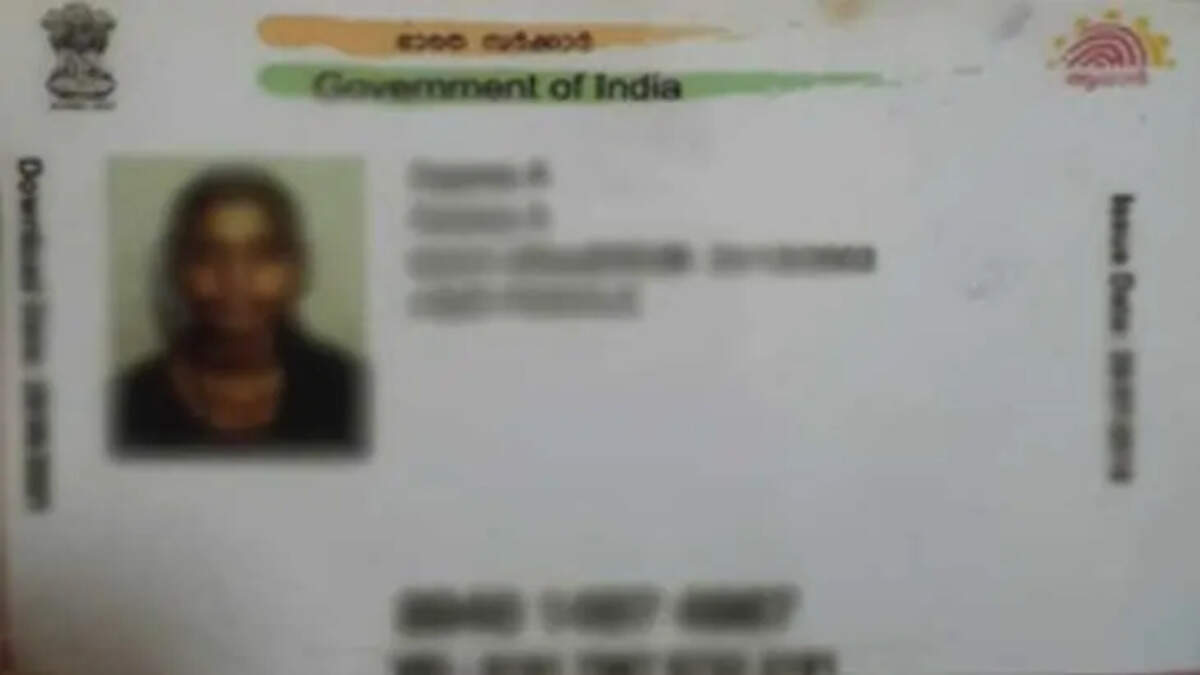 A candidate undergoing Aadhaar verification at a UPSC exam center
