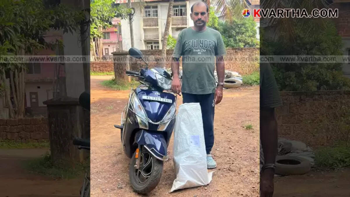 Excise team with seized Mahe liquor in Kannur.