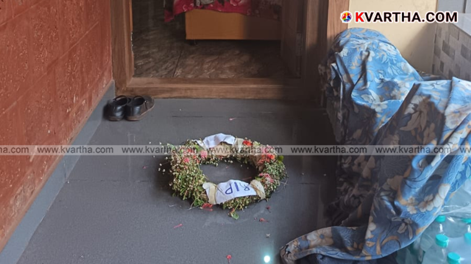 A wreath placed on the veranda of a house in Taliparamba.