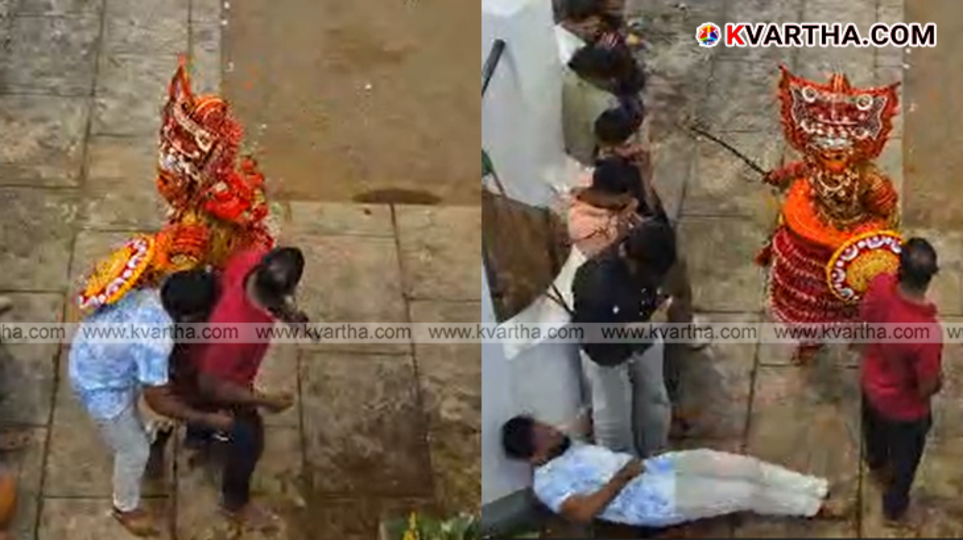 Theyyam performer in ritual attire with shield
