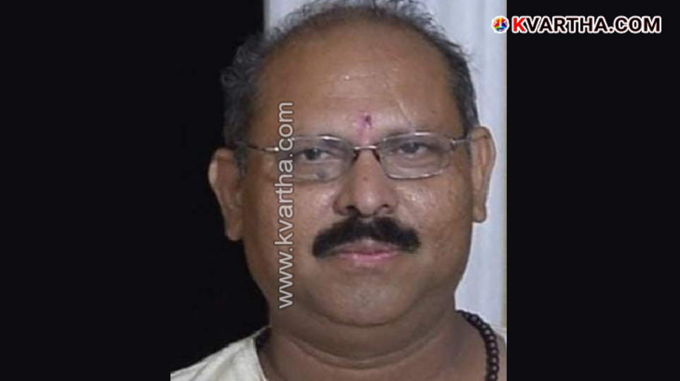 A picture of an autorickshaw driver who died in a train accident.