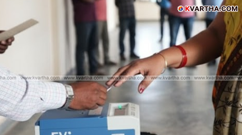 Voters queuing at a polling booth in Bihar