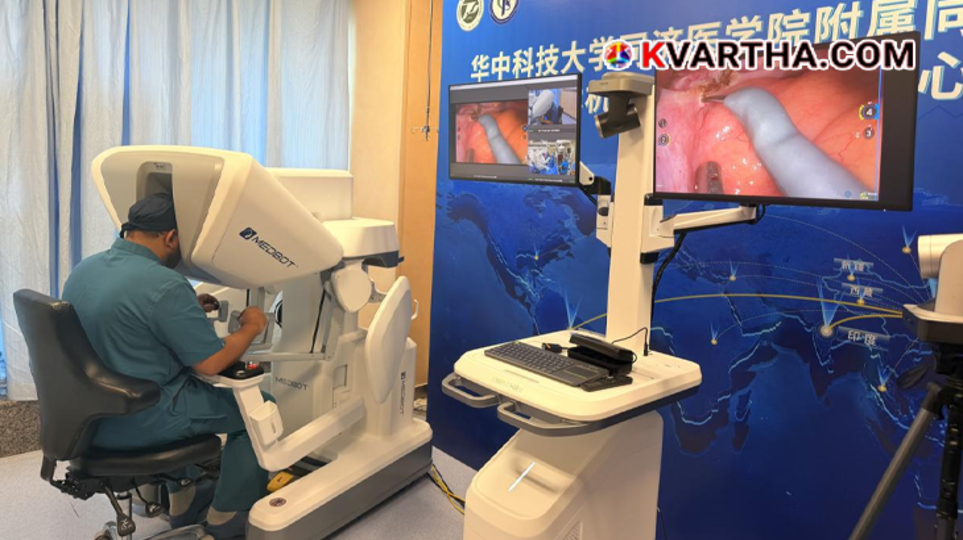 Dr. Syed Mohammed Ghouse monitoring the remote robotic surgery from his control unit in Wuhan.