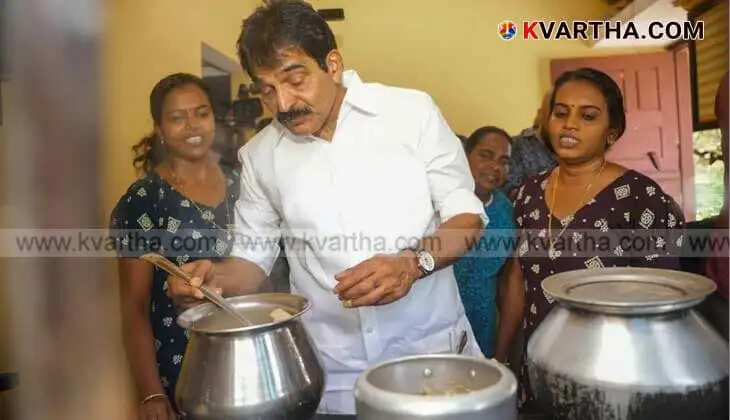  K.C. Venugopal cooking tapioca in a kitchen as part of protest against inflation