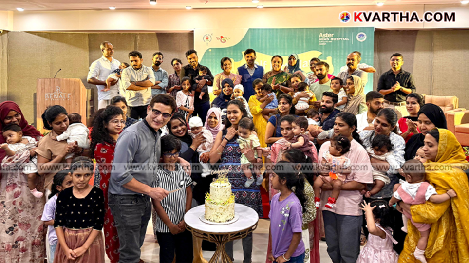 Group of babies and parents at Aster Mims Half Birthday