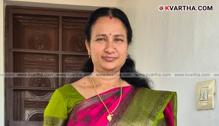 Teacher CP Vinod and wife Sreeja family photo