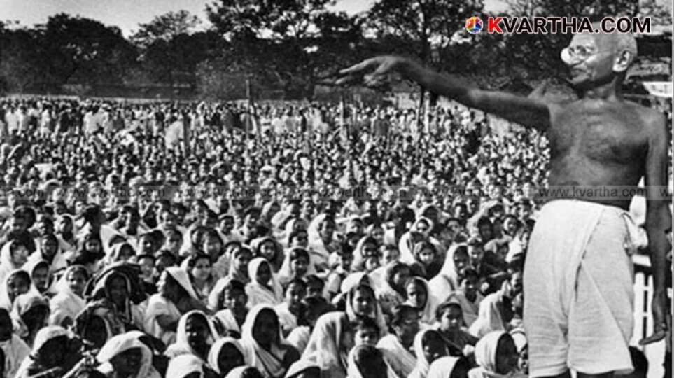 A black and white photo of people protesting during the Quit India Movement.