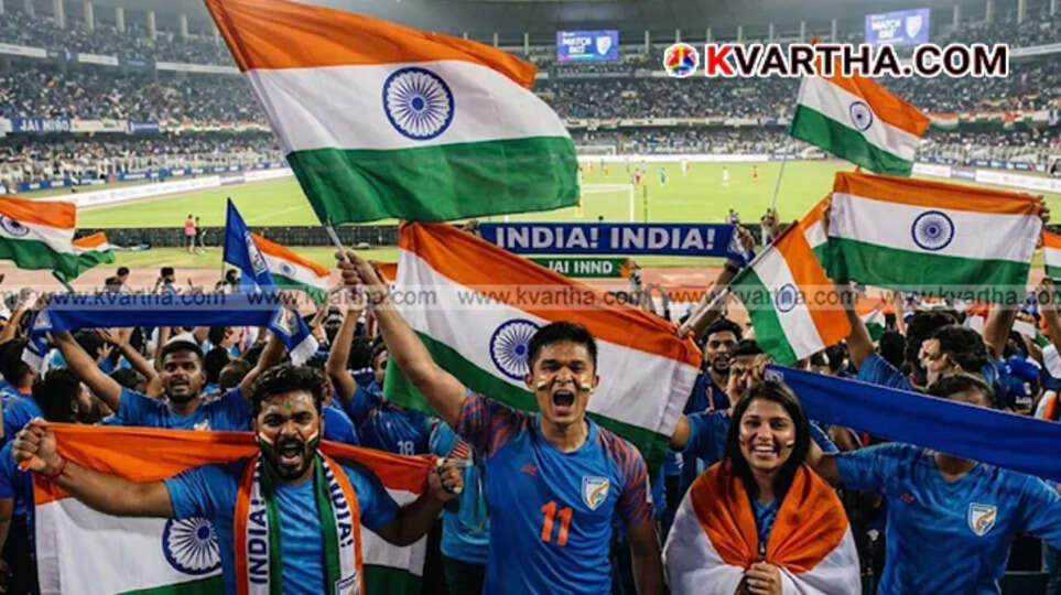  Indian football fans holding flags and cheering during a major tournament match