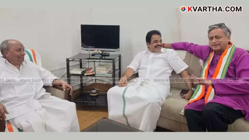 Shashi Tharoor along with KC Venugopal and AK Antony at KPCC headquarters.