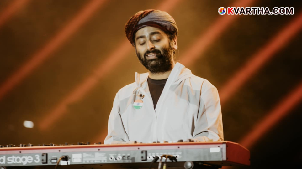 Arijit Singh at a public event, engaging with people.