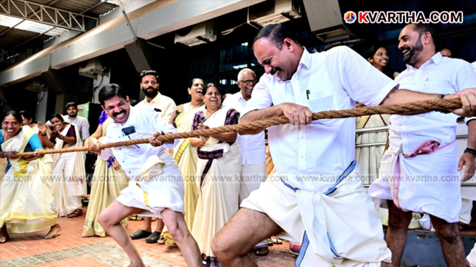 Kannur District Panchayat members celebrating Onam with a grand feast.