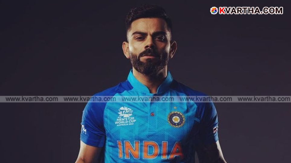 Close-up of Virat Kohli chewing gum during a cricket match.