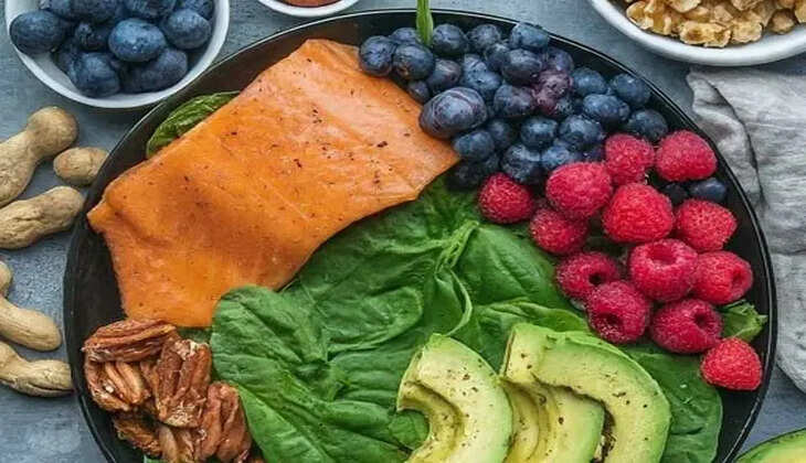 A collage of various anti-inflammatory foods like turmeric, fish, berries, and avocado.
