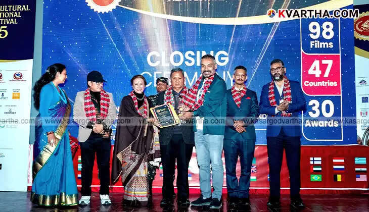  Actor Manjul receiving the Best Actor award at the Nepal Film Festival for the movie 'Poov'.