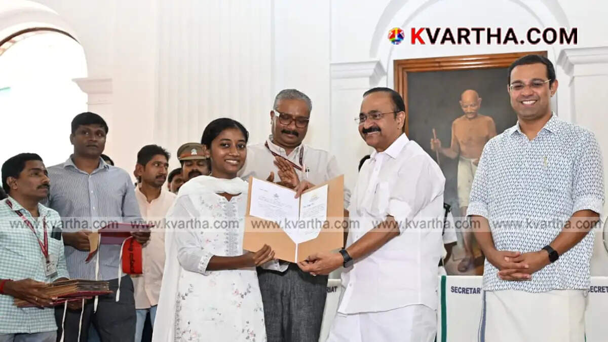 Image representing Chief Minister V D Satheesan handing over appointment orders to assistant professors