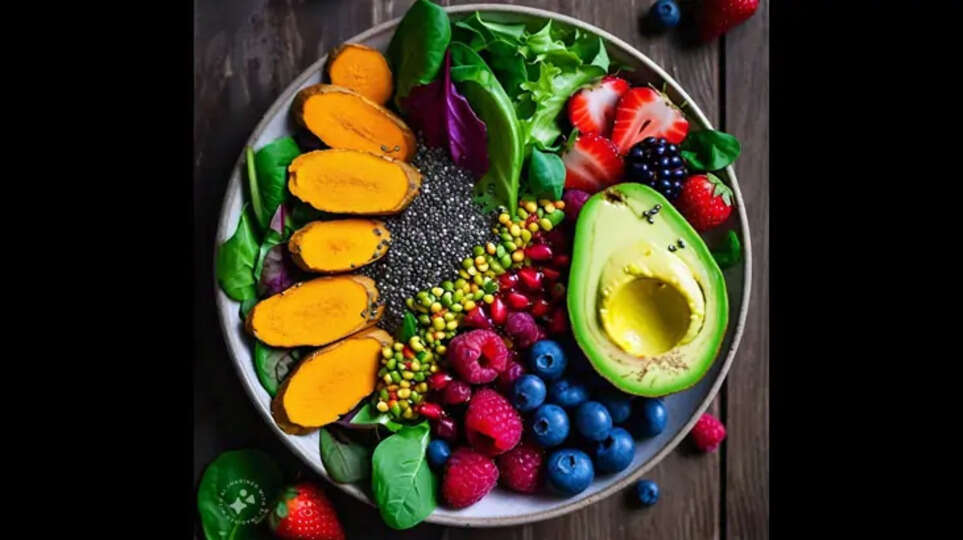 A bowl of colorful fruits, vegetables, and nuts