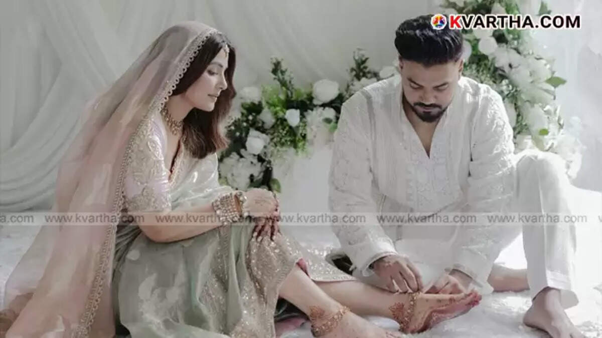 Hina Khan and Rocky Jaiswal on their wedding day, smiling.
