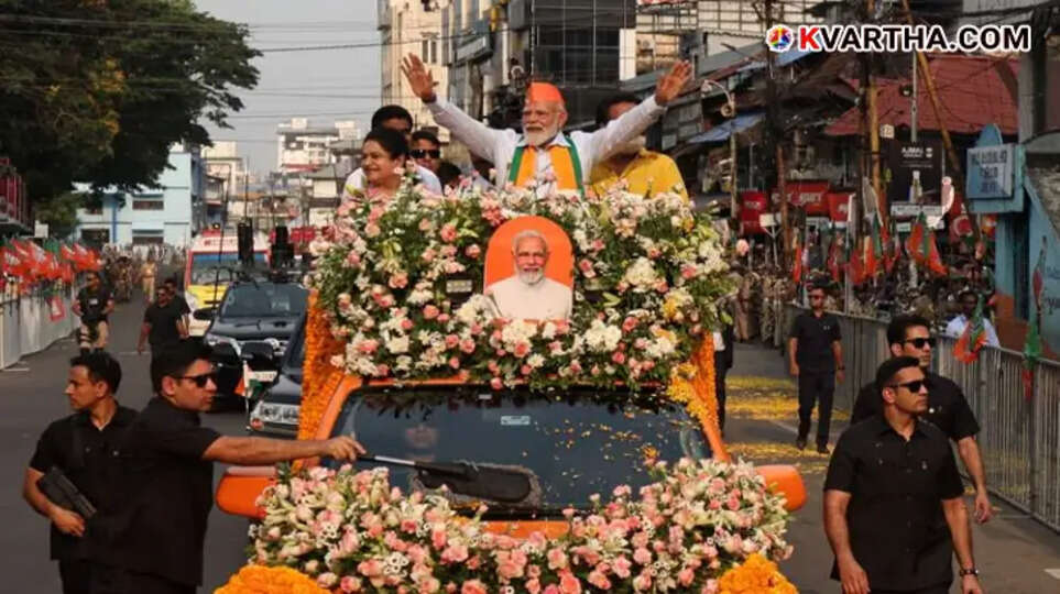 Prime Minister Narendra Modi during a massive roadshow in Thrissur for the 2026 Kerala Assembly Election campaign.