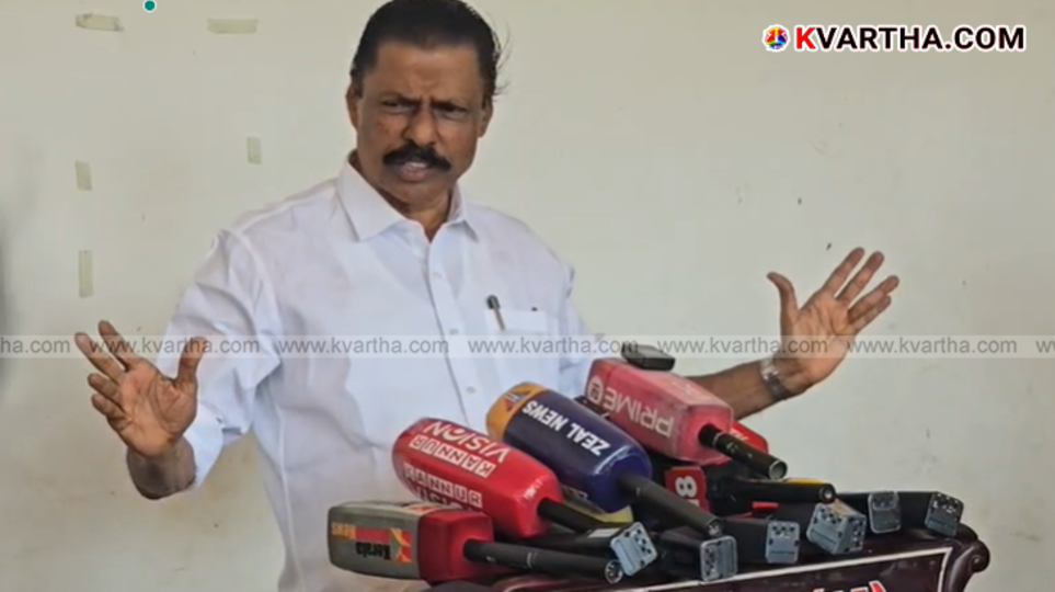 MV Govindan speaking to reporters