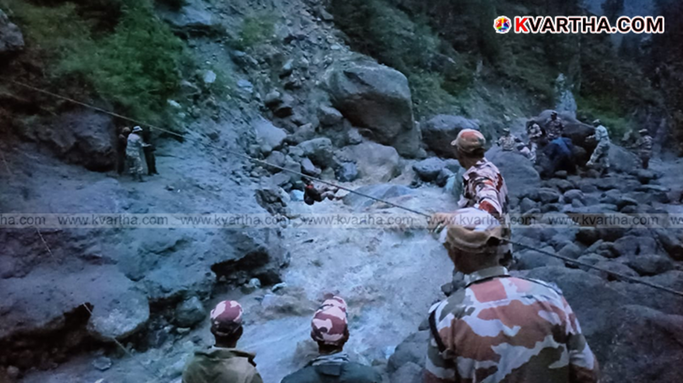 ITBP personnel rescue pilgrims using zip line after cloudburst in Himachal Pradesh.