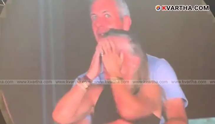Screenshot from Coldplay concert 'Kiss Cam' viral video