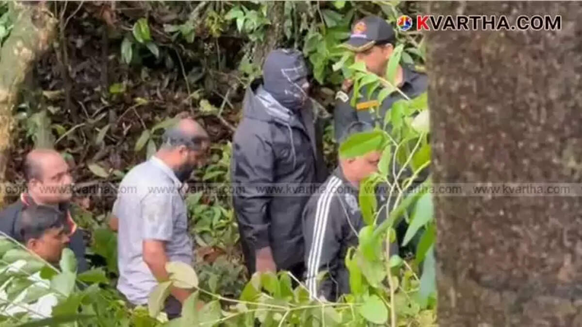  Police and forensic team conducting a search operation in a forest area