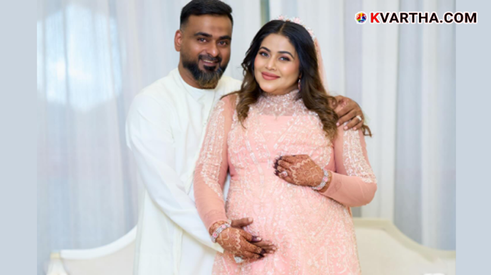  Actress Shamna Kasim in a beautiful maternity photoshoot wearing her husband's gifted gown.