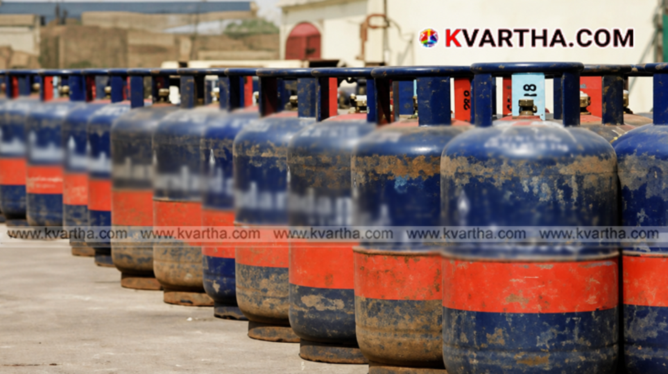 A row of commercial LPG cylinders stacked outside a closed restaurant, symbolizing the gas crisis in Kerala.