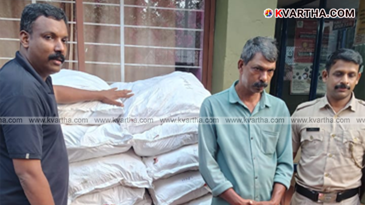 Police officers standing next to seized sacks of tobacco products from a car in Iritty