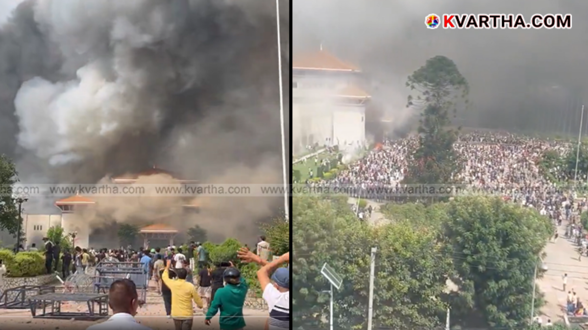 Smoke rising from the Nepal Parliament building during the protests.