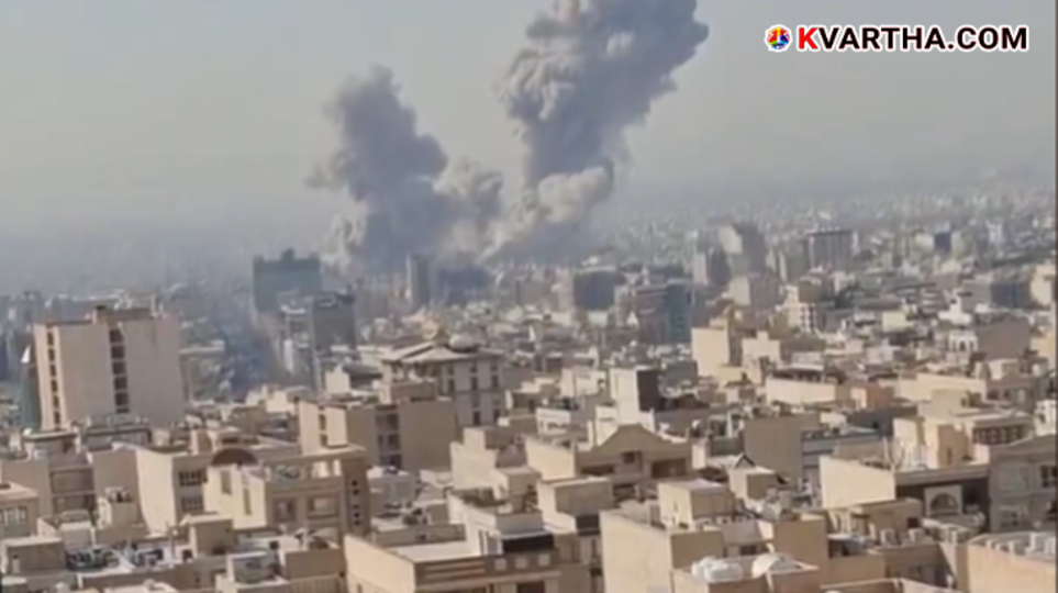 Smoke rising from the skyline of Tehran after an explosion.