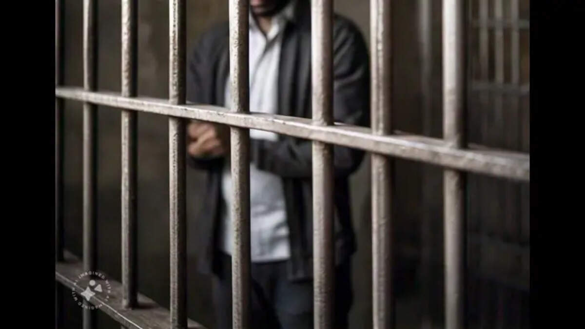 NIA officials arresting the accused