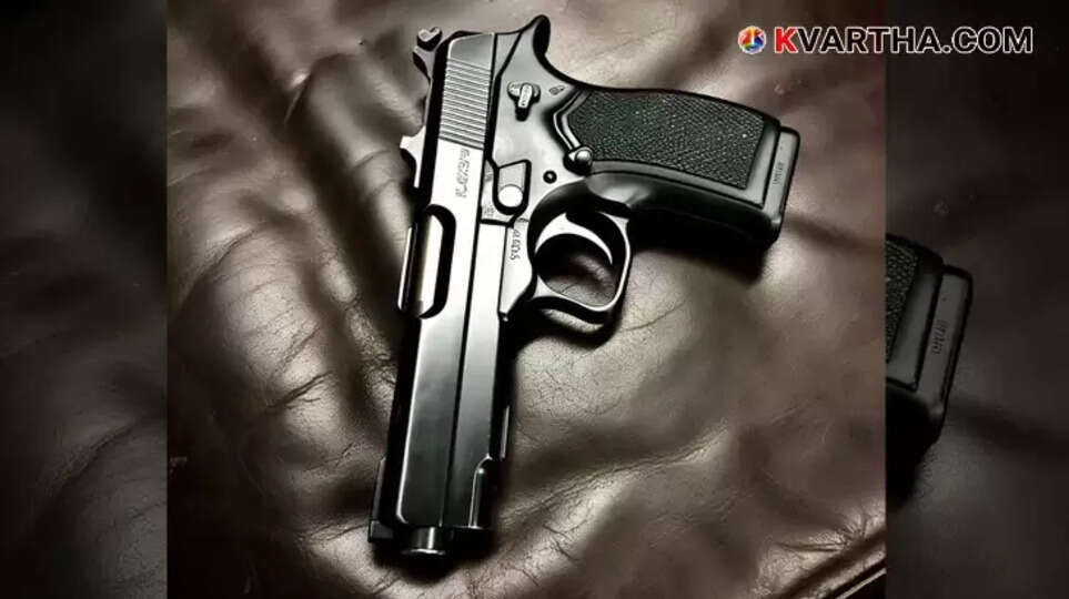 Police arresting the injured ATM robbers after the firing incident in Kalaburagi.