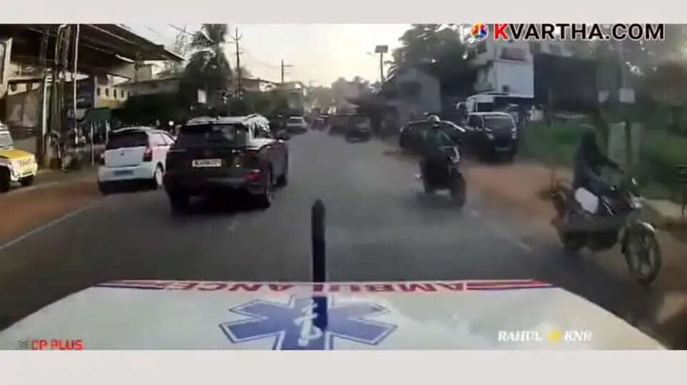  An ambulance stuck in traffic due to a car blocking the road in Eranholi