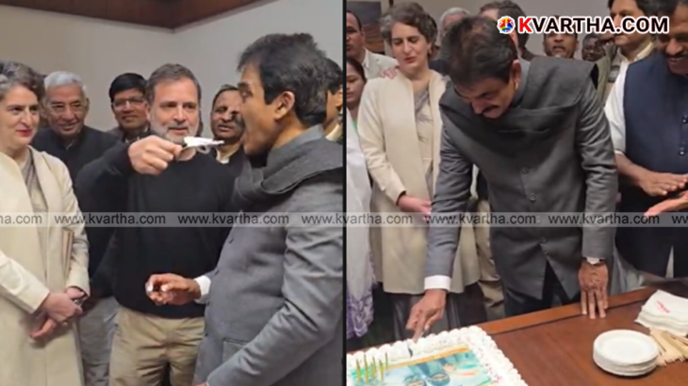 KC Venugopal cutting cake with Rahul Gandhi and Priyanka Gandhi at Parliament.