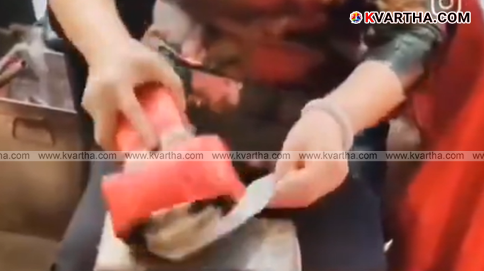 A professional villain hitter in Hong Kong performing the Da Siu Yan ritual.