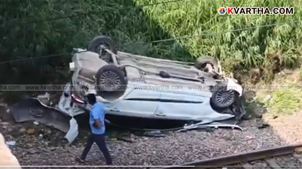 A car that crashed from a flyover and landed on a railway track in Delhi.