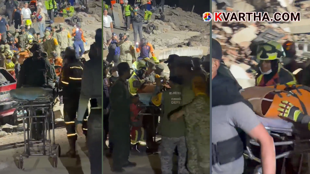 Rescuers saving a child from rubble