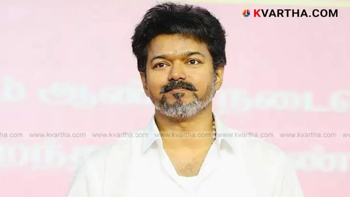 Actor Vijay speaking at a political rally in Tamil Nadu.