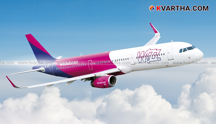 Wizz Air aircraft on tarmac.