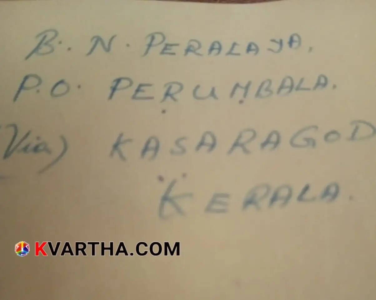 An old, hand-written autograph book with vintage pages.