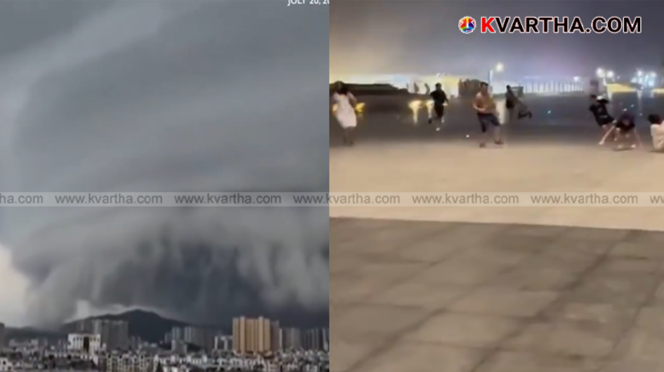 People struggling in strong winds during Typhoon Wipha
