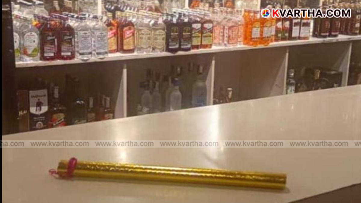Image of a flute placed on a bar counter, as seen in the controversial social media post.