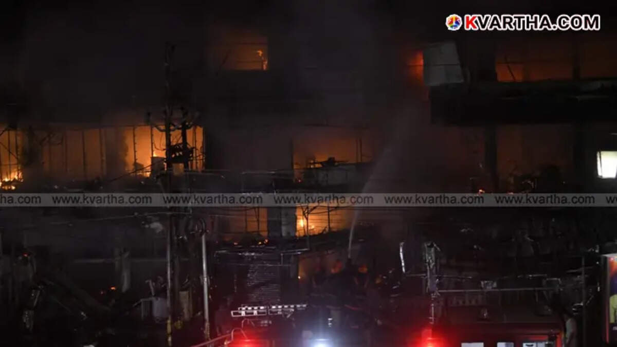 Fire force units fighting fire in Taliparamba