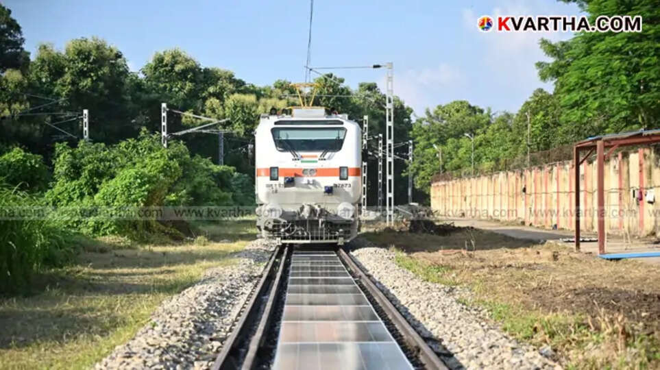 Solar panels installed between railway tracks in Varanasi, India.