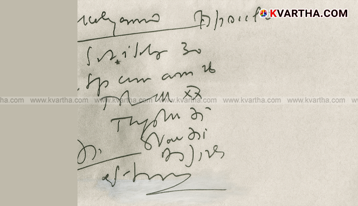 Doctor writing a prescription in a medical setting.