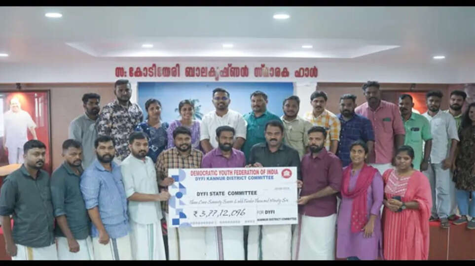 DYFI Leaders Handing Over A Cheque For Wayanad Flood Relief