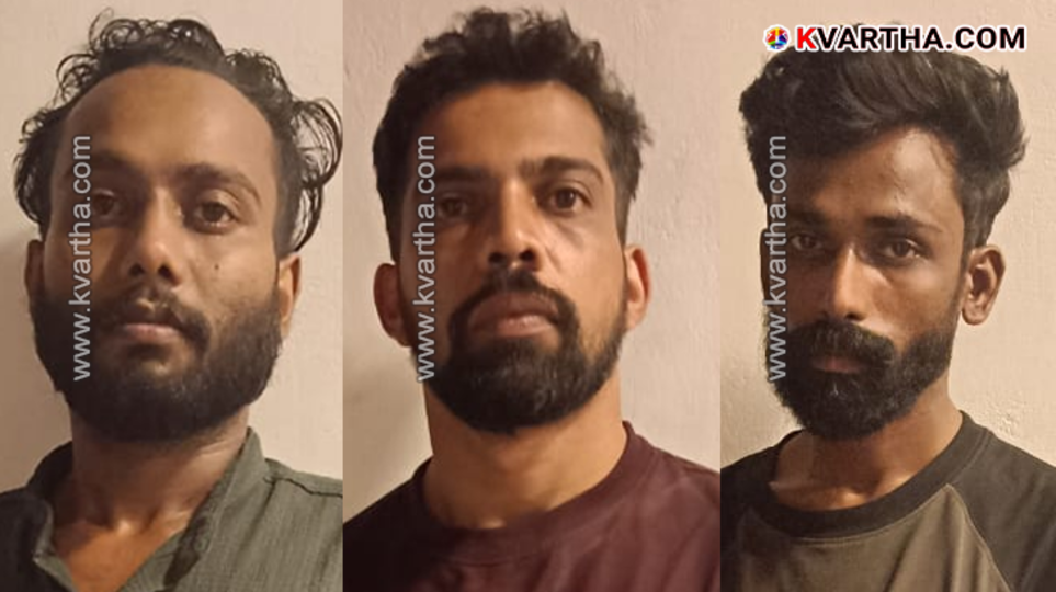 Image of police officials with seized MDMA packets.