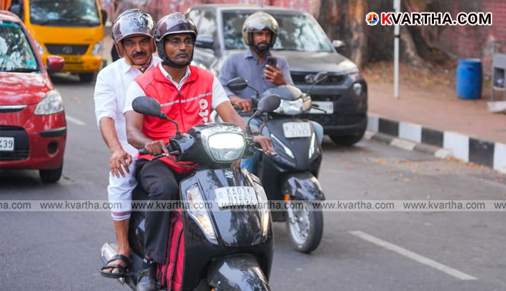 KC Venugopal MP riding pillion with a Swiggy delivery executive in Thiruvananthapuram.